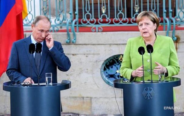 Путин объяснил Меркель ситуацию по нормандскому формату