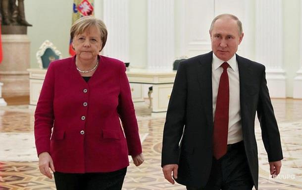 Путин и Меркель обсудили особый статус Донбасса